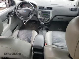 2007 Ford Focus S z VIN 1FAHP34N57W223198, wystawiony jako Copart lot #55725345 z przebiegiem 174 833 mil mil oraz Szkoda całkowita • Salvage title. Historia ofert i sprzedaży dostępna na DreamBid. Obrazek 8.