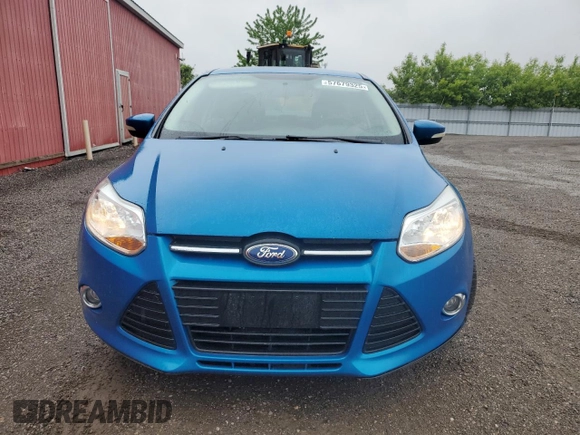 2013 Ford Focus SE z VIN 1FADP3F21DL310739, wystawiony jako Copart lot #57679325 z przebiegiem 225 860 mil mil oraz Czysty tytuł • Clean title. Historia ofert i sprzedaży dostępna na DreamBid. Obrazek 5.