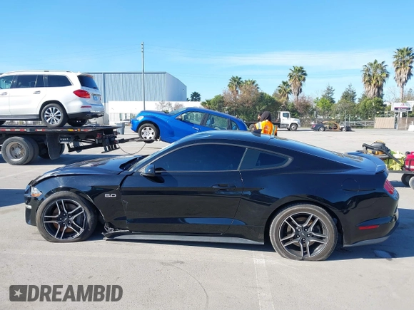 2021 Ford Mustang GT z VIN 1FA6P8CF6M5149175, wystawiony jako IAAI lot #41798328 z przebiegiem 61 776 mil mil oraz . Historia ofert i sprzedaży dostępna na DreamBid. Obrazek 14.