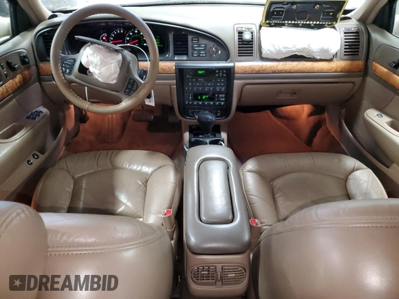 1998 Lincoln Continental with VIN 1LNFM97V9WY604317, listed as a Copart auction lot 83999234 with 91,277 mi miles and Salvage Title. Bid and sale history available at carsss.com. Image 8.