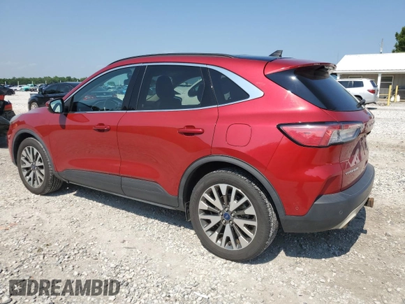 2020 Ford Escape Titanium with VIN 1FMCU9J95LUB28584, listed as a Copart auction lot 59967785 with 94,392 mi miles and Salvage title. Bid and sale history available at DreamBid. Image 2.