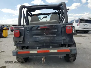 1995 Jeep Wrangler S with VIN 1J4FY19P4SP288991, listed as a Copart auction lot 48858575 with 138,821 mi miles and Salvage Title. Bid and sale history available at carsss.com. Image 6.
