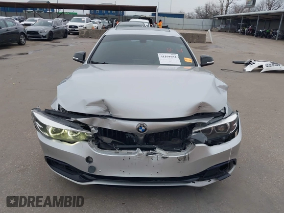2018 BMW 4 Series 440i with VIN WBA4J5C57JBF07924, listed as a IAAI auction lot 41595682 with 75,121 mi miles and . Bid and sale history available at DreamBid. Image 12.