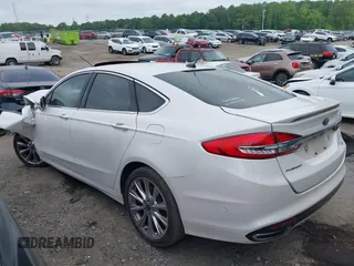 2017 Ford Fusion Titanium with VIN 3FA6P0K96HR105127, listed as a IAAI auction lot 39351701 with 103,295 mi miles. Bid and sale history available at carsss.com. Image 3.