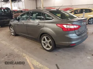 2013 Ford Focus Titanium with VIN 1FADP3J23DL265049, listed as a IAAI auction lot 41765621 with 100,550 mi miles and . Bid and sale history available at carsss.com. Image 3.
