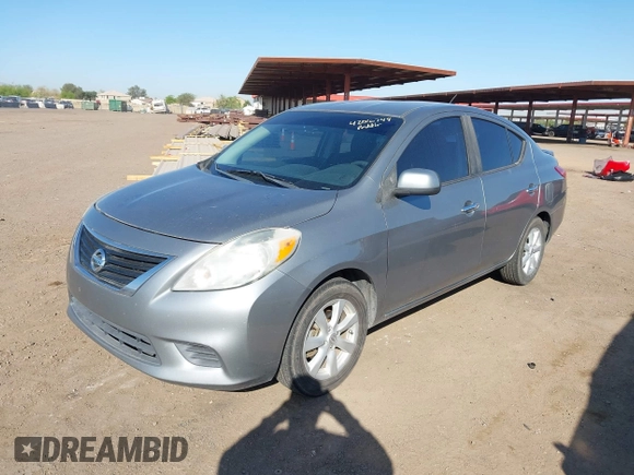 2014 Nissan Versa SV with VIN 3N1CN7AP0EL841381, listed as a IAAI auction lot 42016744 with 137,699 mi miles. Bid and sale history available at carsss.com. Image 2.