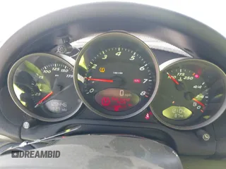 2007 Porsche Boxster с VIN WP0CA29837U710558, выставлен на аукционе IAAI как лот 42506943 с пробегом 129 446 миль миль и . История ставок и продаж доступна на DreamBid. Изображение 7.