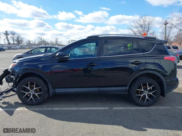 2018 Toyota RAV4 SE with VIN 2T3JFREVXJW817341, listed as a IAAI auction lot 41599972 with 99,739 mi miles. Bid and sale history available at carsss.com. Image 14.