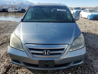 2007 Honda Odyssey EX-L with VIN 5FNRL38647B023186, listed as a Copart auction lot 87697035 with 190,884 mi miles and Salvage Title. Bid and sale history available at carsss.com. Image 5.