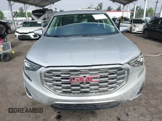 2020 GMC Terrain Denali z VIN 3GKALXEX0LL294117, wystawiony jako IAAI lot #42343656 z przebiegiem 67 697 mil mil oraz . Historia ofert i sprzedaży dostępna na DreamBid. Obrazek 6.