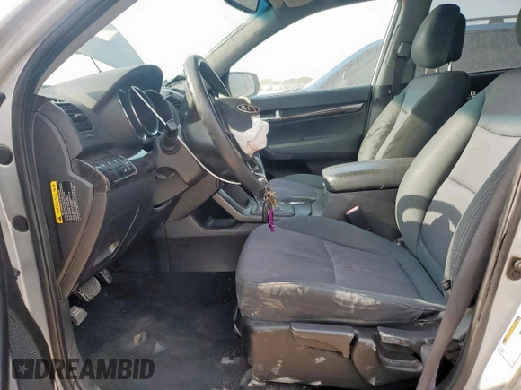 2013 Kia Sorento LX with VIN 5XYKT3A12DG370116, listed as a Copart auction lot 57598675 with 203,902 mi miles and Salvage title. Bid and sale history available at DreamBid. Image 7.