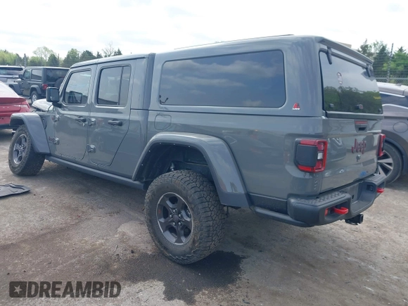 2021 Jeep Gladiator Rubicon with VIN 1C6JJTBG8ML619972, listed as a IAAI auction lot 42057805 with 37,875 mi miles and . Bid and sale history available at DreamBid. Image 3.