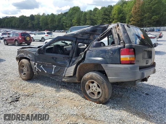 1996 Jeep Grand Cherokee Laredo with VIN 1J4FX58S6TC349590, listed as a Copart auction lot 72278714 with 0 mi miles and Salvage Title. Bid and sale history available at carsss.com. Image 2.