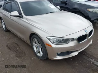 2013 BMW 3 Series 328i xDrive with VIN WBA3B3C57DF530904, listed as a IAAI auction lot 41525397 with 158,310 mi miles. Bid and sale history available at carsss.com. Image 1.