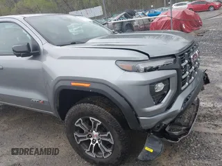 2024 GMC Canyon 4WD AT4 with VIN 1GTP6DEKXR1143138, listed as a IAAI auction lot 41952154 with 26,062 mi miles. Bid and sale history available at carsss.com. Image 19.
