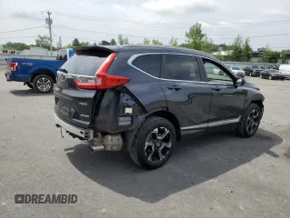 2018 Honda CR-V Touring with VIN 7FARW2H93JE048507, listed as a Copart auction lot 64071705 with 69,051 mi miles and Salvage title. Bid and sale history available at DreamBid. Image 3.