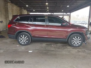 2020 Honda Pilot EX z VIN 5FNYF6H34LB021295, wystawiony jako IAAI lot #42051719 z przebiegiem 89 277 mil mil oraz . Historia ofert i sprzedaży dostępna na DreamBid. Obrazek 14.