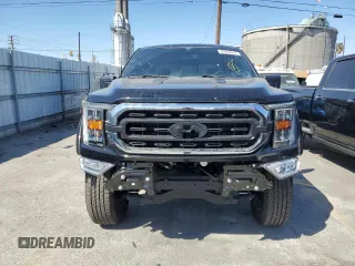2021 Ford F-150 XL with VIN 1FTFW1E54MFD11453, listed as a Copart auction lot 50240015 with 8,645 mi miles and Salvage title. Bid and sale history available at DreamBid. Image 5.