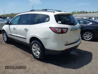 2015 Chevrolet Traverse LS z VIN 1GNKVFED8FJ257149, wystawiony jako IAAI lot #42060101 z przebiegiem 150 738 mil mil oraz . Historia ofert i sprzedaży dostępna na DreamBid. Obrazek 3.