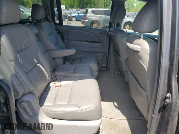 2008 Honda Odyssey Touring z VIN 5FNRL38978B099190, wystawiony jako Copart lot #55905235 z przebiegiem 135 559 mil mil oraz Szkoda całkowita • Salvage title. Historia ofert i sprzedaży dostępna na DreamBid. Obrazek 11.
