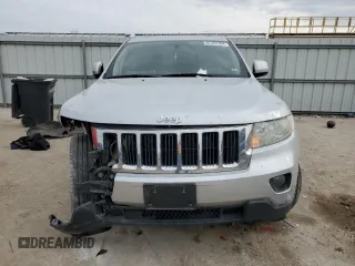 2011 Jeep Grand Cherokee 70th Anniversary with VIN 1J4RR4GT0BC666579, listed as a Copart auction lot 87322784 with 163,439 mi miles and Salvage Title. Bid and sale history available at carsss.com. Image 5.