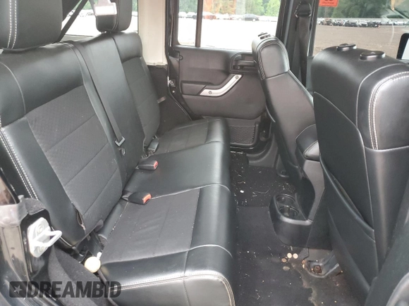 2012 Jeep Wrangler Unlimited Call of Duty MW3 with VIN 1C4BJWFG0CL218214, listed as a Copart auction lot 58432635 with 109,128 mi miles and Clean title. Bid and sale history available at DreamBid. Image 10.