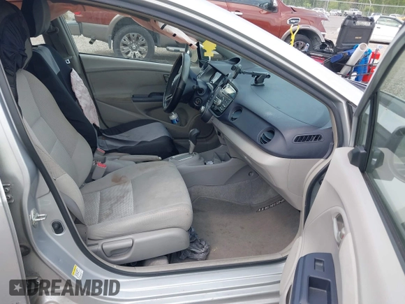 2010 Honda Insight LX with VIN JHMZE2H52AS038807, listed as a IAAI auction lot 42120846 with 242,816 mi miles and . Bid and sale history available at DreamBid. Image 5.
