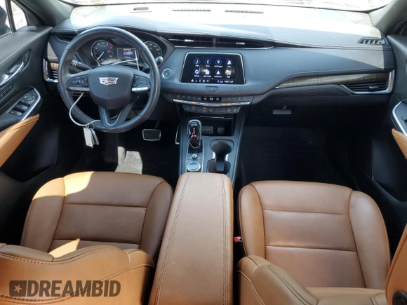 2020 Cadillac XT4 FWD Sport with VIN 1GYFZER48LF012489, listed as a Copart auction lot 54434025 with 74,249 mi miles and Salvage title. Bid and sale history available at DreamBid. Image 8.