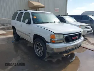 2002 GMC Yukon SLT with VIN 1GKEC13V02R300098, listed as a IAAI auction lot 41583951 with 247,780 mi miles. Bid and sale history available at carsss.com. Image 1.