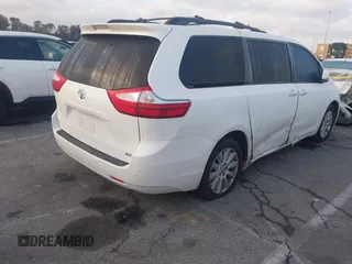 2015 Toyota Sienna Ltd with VIN 5TDDK3DC8FS100841, listed as a IAAI auction lot 41539557 with 219,816 mi miles. Bid and sale history available at carsss.com. Image 4.