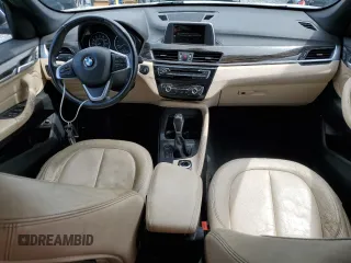 2017 BMW X1 xDrive28i with VIN WBXHT3Z37H4A55614, listed as a Copart auction lot 63491415 with 120,680 mi miles and Salvage title. Bid and sale history available at DreamBid. Image 8.
