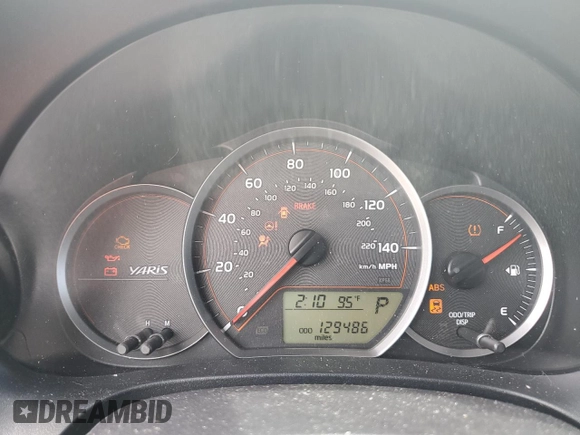 2014 Toyota Yaris L with VIN VNKJTUD37EA008192, listed as a Copart auction lot 70955594 with 129,486 mi miles and Salvage Title. Bid and sale history available at carsss.com. Image 9.
