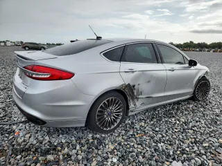 2018 Ford Fusion Titanium with VIN 3FA6P0D91JR207051, listed as a Copart auction lot 59539135 with 204,017 mi miles and Salvage title. Bid and sale history available at DreamBid. Image 3.