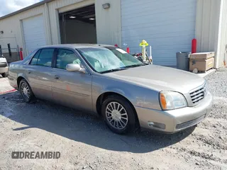 2004 Cadillac DeVille DHS z VIN 1G6KE57Y34U186251, wystawiony jako IAAI lot #40394771 z przebiegiem 150 588 mil mil oraz . Historia ofert i sprzedaży dostępna na DreamBid. Obrazek 1.