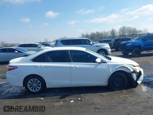 2016 Toyota Camry XLE with VIN 4T1BF1FK1GU155709, listed as a IAAI auction lot 41556465 with 159,923 mi miles and . Bid and sale history available at DreamBid. Image 13.