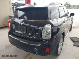 2017 MINI Countryman Cooper with VIN WMZYV5C30H3E01844, listed as a IAAI auction lot 41297336 with 16,946 mi miles. Bid and sale history available at carsss.com. Image 4.