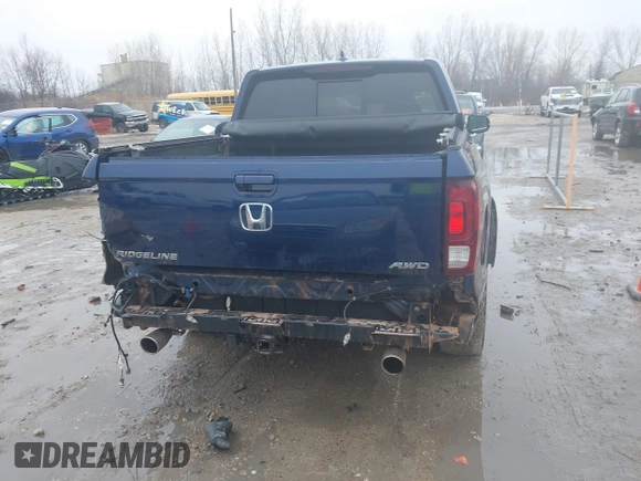 2022 Honda Ridgeline RTL-E with VIN 5FPYK3F72NB036226, listed as a IAAI auction lot 41706285 with 30,869 mi miles and . Bid and sale history available at DreamBid. Image 17.