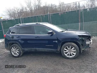 2016 Jeep Cherokee Limited with VIN 1C4PJMDB2GW181432, listed as a IAAI auction lot 41675868 with 106,979 mi miles. Bid and sale history available at carsss.com. Image 14.