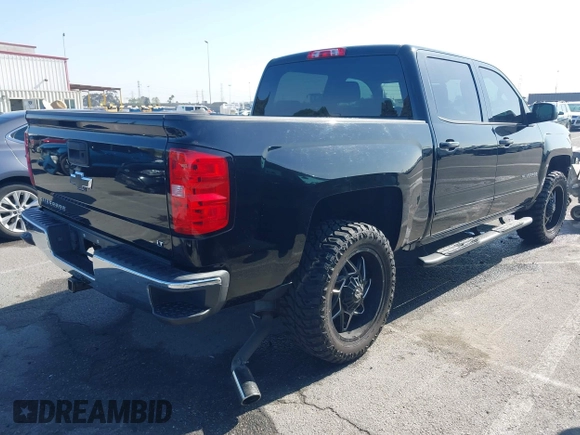 2017 Chevrolet Silverado 1500 LT with VIN 3GCPCREC5HG471758, listed as a IAAI auction lot 41991708 with 77,056 mi miles. Bid and sale history available at carsss.com. Image 4.
