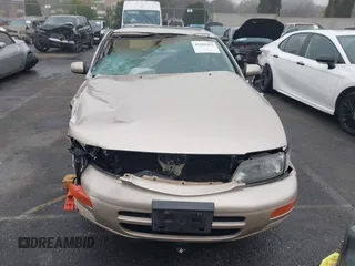 1995 Nissan Maxima GLE z VIN JN1CA21DXST075946, wystawiony jako IAAI lot #41669451 z przebiegiem 154 423 mil mil oraz . Historia ofert i sprzedaży dostępna na DreamBid. Obrazek 12.