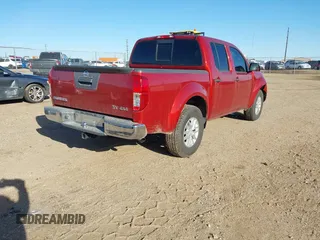 2015 Nissan Frontier SV with VIN 1N6AD0EV9FN700301, listed as a IAAI auction lot 41771088 with 136,749 mi miles and . Bid and sale history available at DreamBid. Image 4.