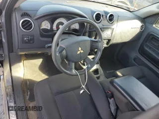 2007 Mitsubishi Raider LS z VIN 1Z7HC22K67S184917, wystawiony jako Copart lot #77839434 z przebiegiem 189 072 mil mil oraz Czysty tytuł • Clean title. Historia ofert i sprzedaży dostępna na DreamBid. Obrazek 8.