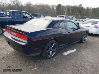 2013 Dodge Challenger R/T with VIN 2C3CDYBT0DH667924, listed as a IAAI auction lot 41278844 with 234,218 mi miles. Bid and sale history available at carsss.com. Image 4.