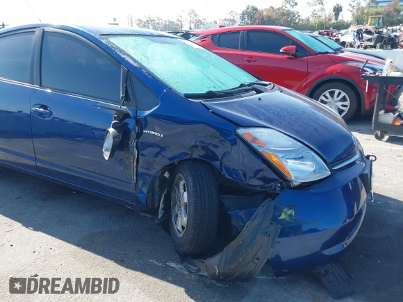 2009 Toyota Prius with VIN JTDKB20U297856633, listed as a IAAI auction lot 42013442 with 247,448 mi miles. Bid and sale history available at carsss.com. Image 6.