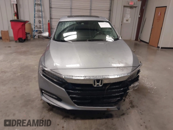 2018 Honda Accord Touring z VIN 1HGCV3F94JA001591, wystawiony jako IAAI lot #42161624 z przebiegiem 100 591 mil mil oraz . Historia ofert i sprzedaży dostępna na DreamBid. Obrazek 13.