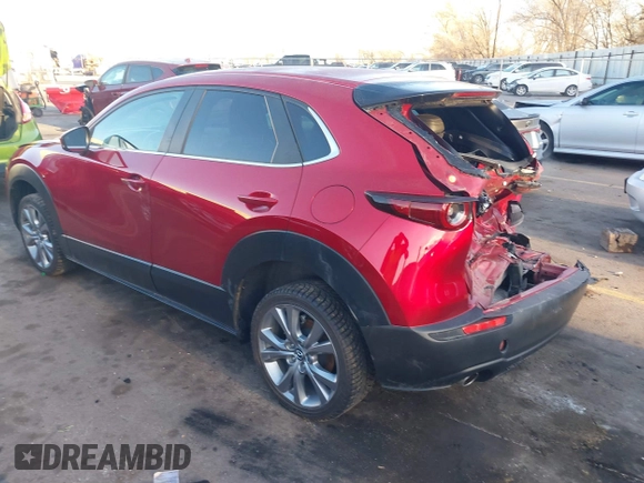 2022 Mazda CX-30 S Carbon Edition с VIN 3MVDMBCL4NM431242, выставлен на аукционе IAAI как лот 41851636 с пробегом 40 982 миль миль и . История ставок и продаж доступна на DreamBid. Изображение 3.