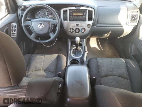 2006 Mazda Tribute S with VIN 4F2YZ04176KM19634, listed as a Copart auction lot 46796315 with 276,632 mi miles and Salvage Title. Bid and sale history available at DreamBid. Image 8.