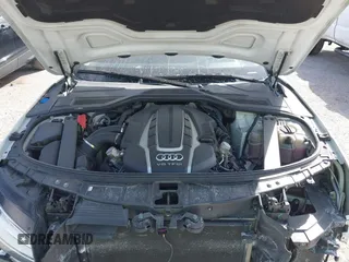 2015 Audi A8 L 4.0T with VIN WAU32AFD4FN002639, listed as a IAAI auction lot 41703951 with 103,722 mi miles. Bid and sale history available at carsss.com. Image 10.
