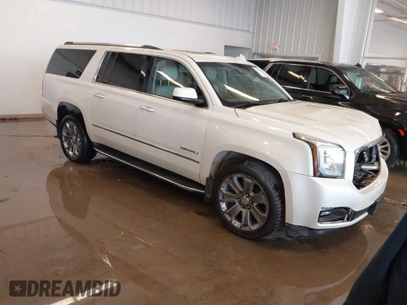 2015 GMC Yukon XL Denali with VIN 1GKS2JKJXFR528927, listed as a IAAI auction lot 41391259 with 159,467 mi miles. Bid and sale history available at carsss.com. Image 1.