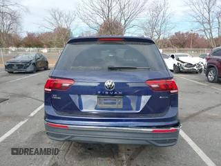 2023 Volkswagen Tiguan SE z VIN 3VVMB7AX3PM006867, wystawiony jako IAAI lot #40793976 z przebiegiem 29 648 mil mil oraz . Historia ofert i sprzedaży dostępna na DreamBid. Obrazek 16.
